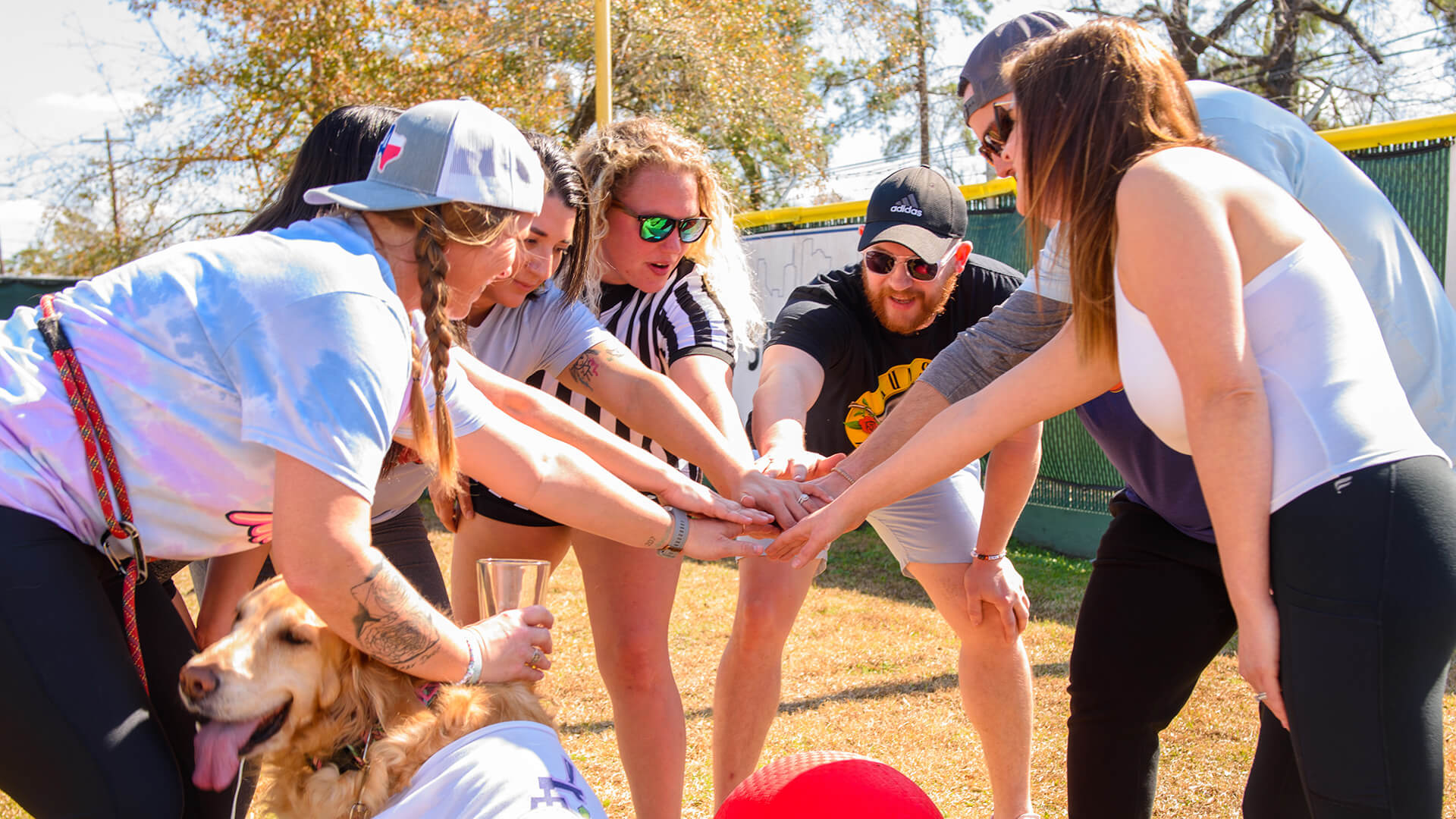 A team of corporate employees enjoying team building activities at a corporate event venue